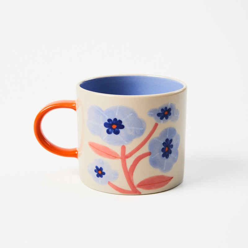 Mug with floral design on a white background